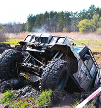 The Road Ahead - image of an offroad vehicle in some serious bother