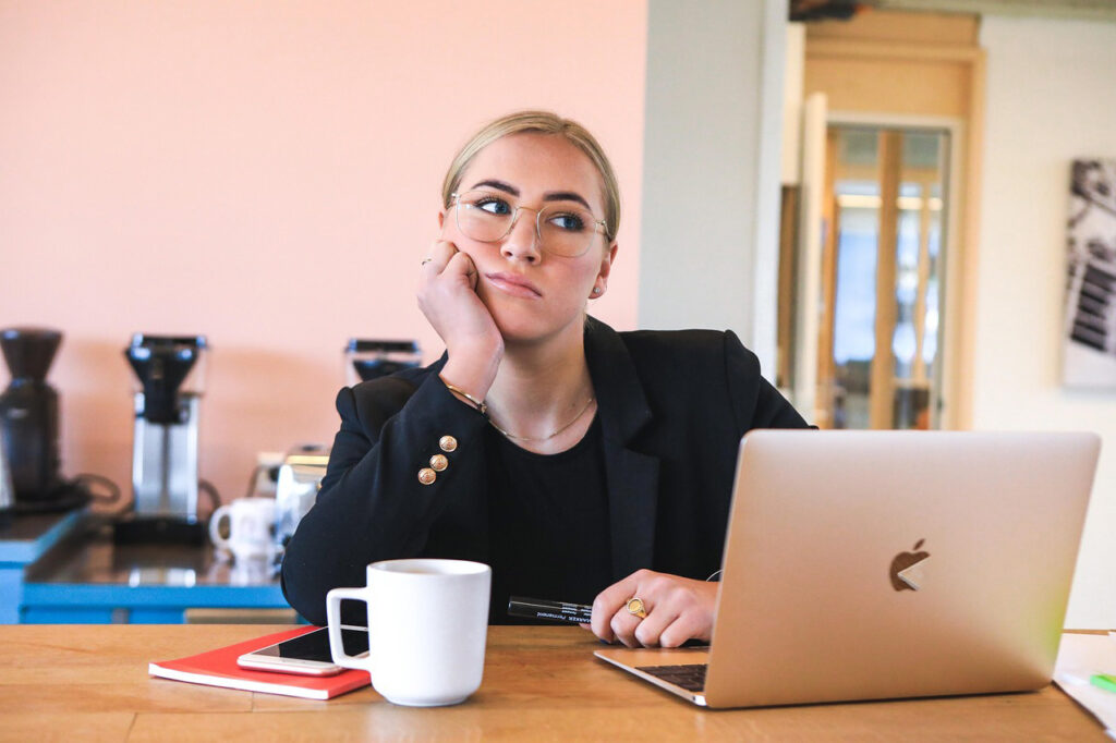 Image of someone being bored at a board meeting - how to get your board on board